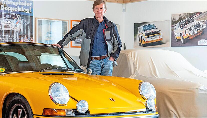 Der zweimalige Rallye-Weltmeister Walter Röhrl, der am Montag seinen 75. Geburtstag feiert, neben einem Porsche 911 aus dem Jahre 1972.
Foto: dpa