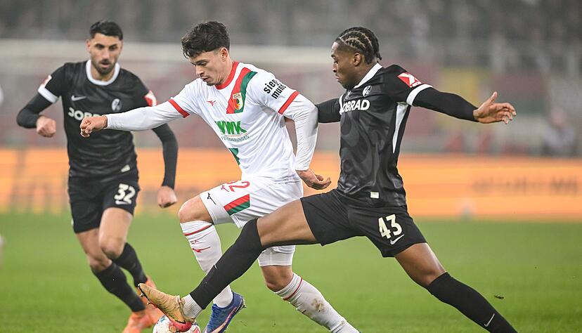 Verteidiger Bruno Ogbus (re) und der SC Freiburg wollen auch in Frankfurt gut verteidigen. (Archivbild)
