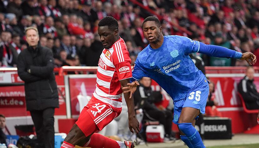 F&uuml;r Christian Kofane (r) und seine Leverkusener wurde es bei Union Berlin das erwartet schwere Spiel.