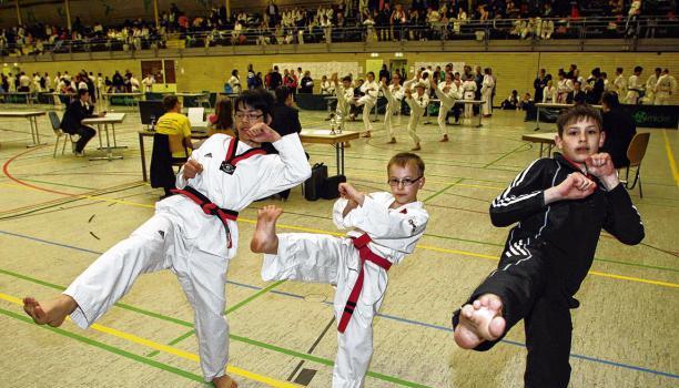Kevin Nguyen (von links) holte sich den Titel, Björn Aheimer wurde in seiner Altersklasse Zweiter. Alexander Trifonov landete auf Rang sechs.Foto: Marc Schmerbeck