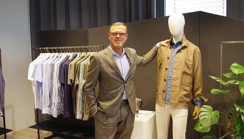 Mark Bezner berichtet von einem schwierigen Jahr f&uuml;r den Bekleidungshersteller Oymp.